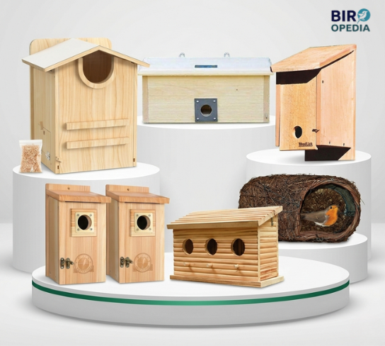 Various birdhouses displayed on pedestals Roosting Box for Wild Birds